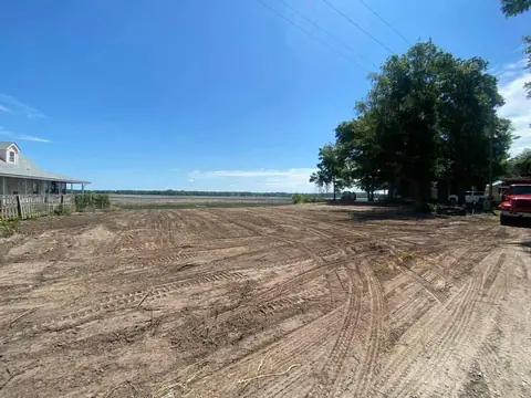 Waterfront lot opened to the marsh line — Coastal Clearing & Debris, Brunswick County NC