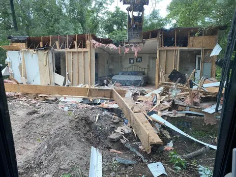 Framing exposed and debris kept in one working pile — Coastal Clearing & Debris, Brunswick County NC