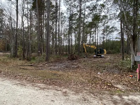 Clearing pushed back off the drive — Coastal Clearing & Debris, Brunswick County NC